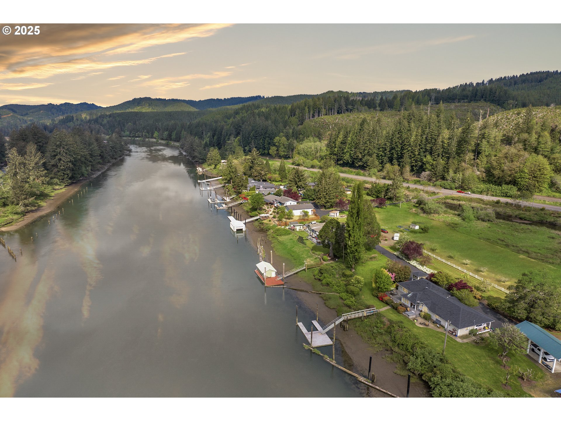 9202 Phey Lane Florence, OR 97439 - Photo 46 of 47 a view of a lake with a mountain
