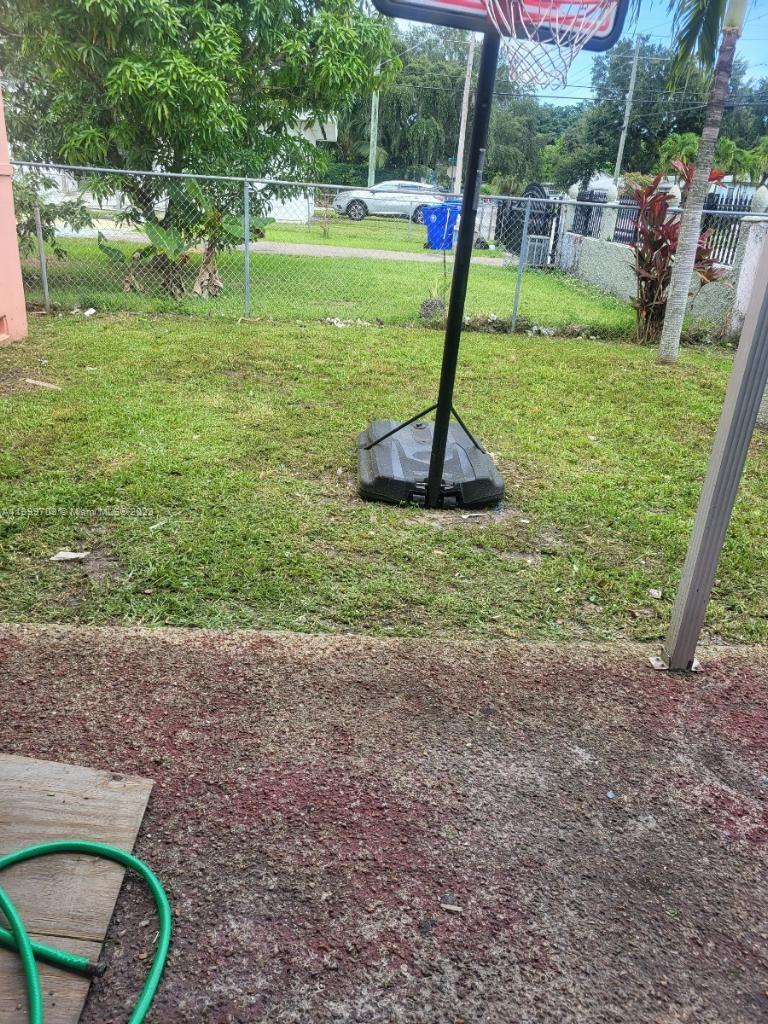 121 Northwest 53rd Street Miami, FL 33127 - Photo 2 of 5 a view of a garden with a slide