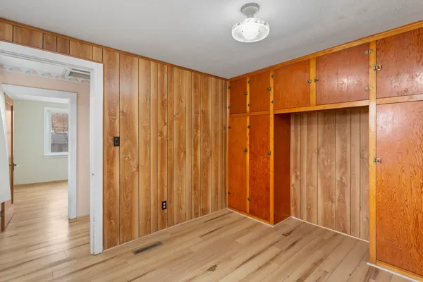 a view of a livingroom with wooden floor