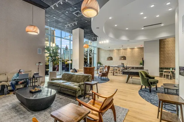 a kitchen with a sink and a refrigerator