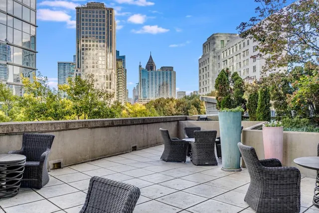 a view of yard with swimming pool and outdoor seating