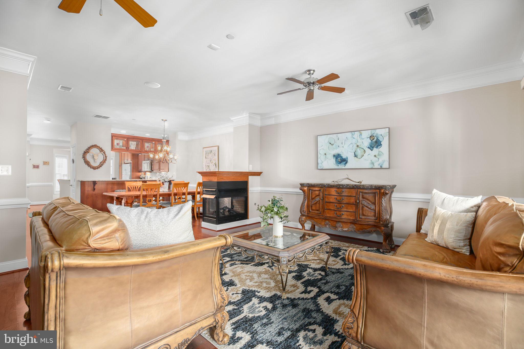 229 Mill Street Occoquan, VA 22125 - Photo 11 of 61 a living room with furniture and a flat screen tv