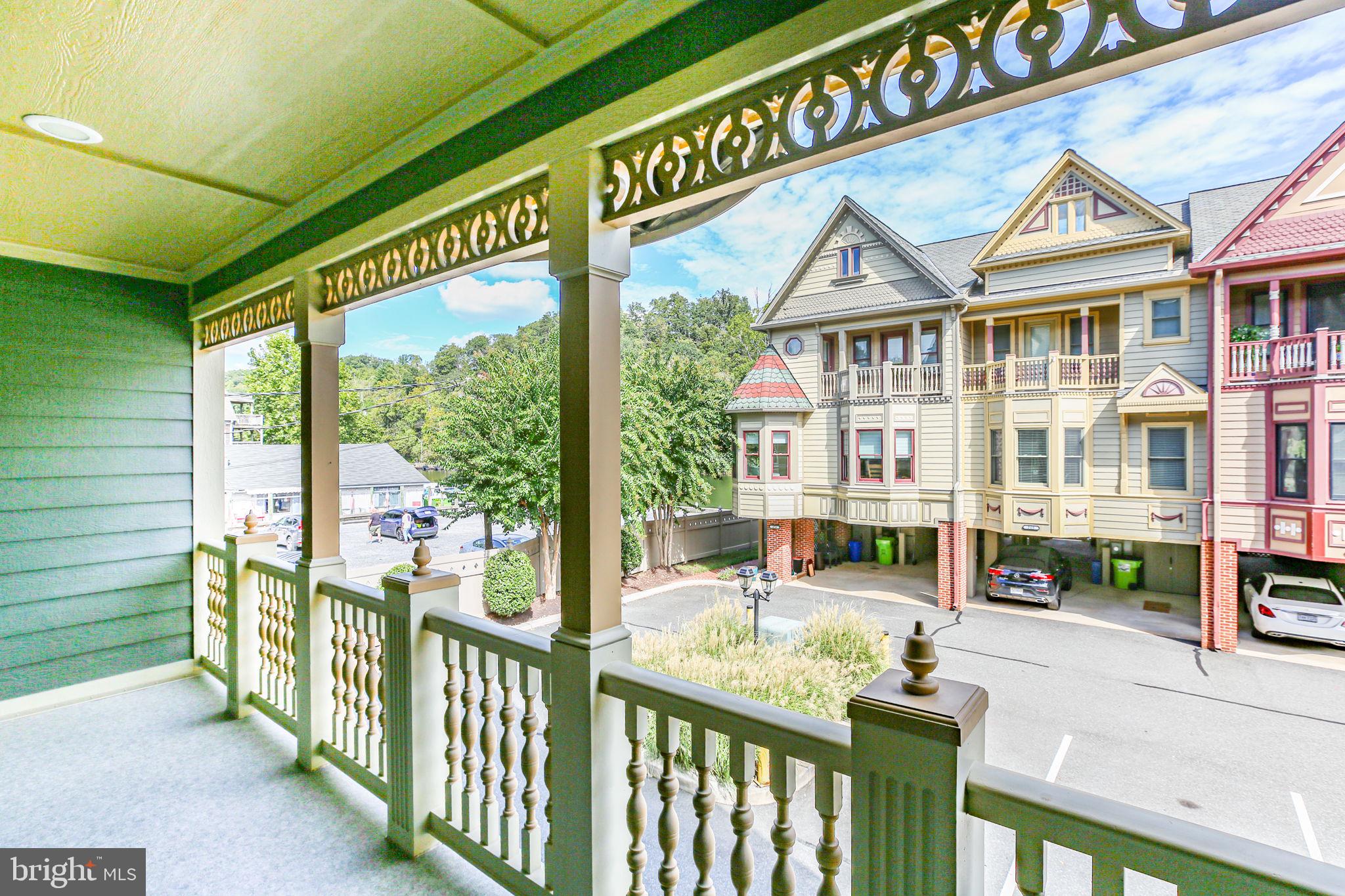 229 Mill Street Occoquan, VA 22125 - Photo 17 of 61 a view of a house with a porch
