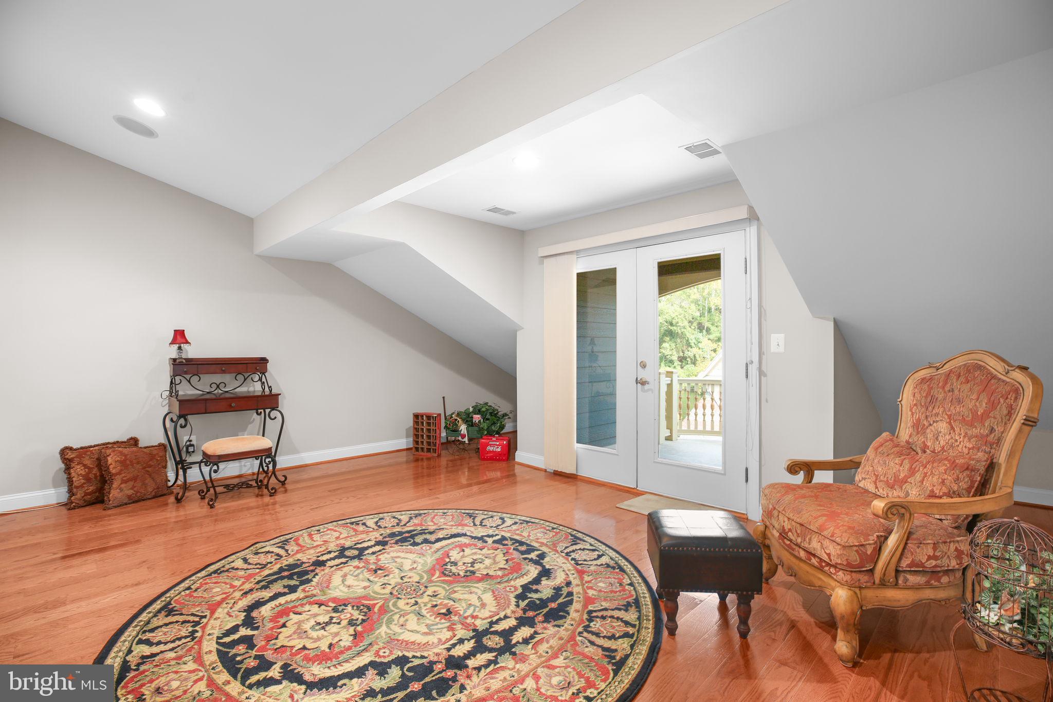 229 Mill Street Occoquan, VA 22125 - Photo 30 of 61 a living room with furniture and a window