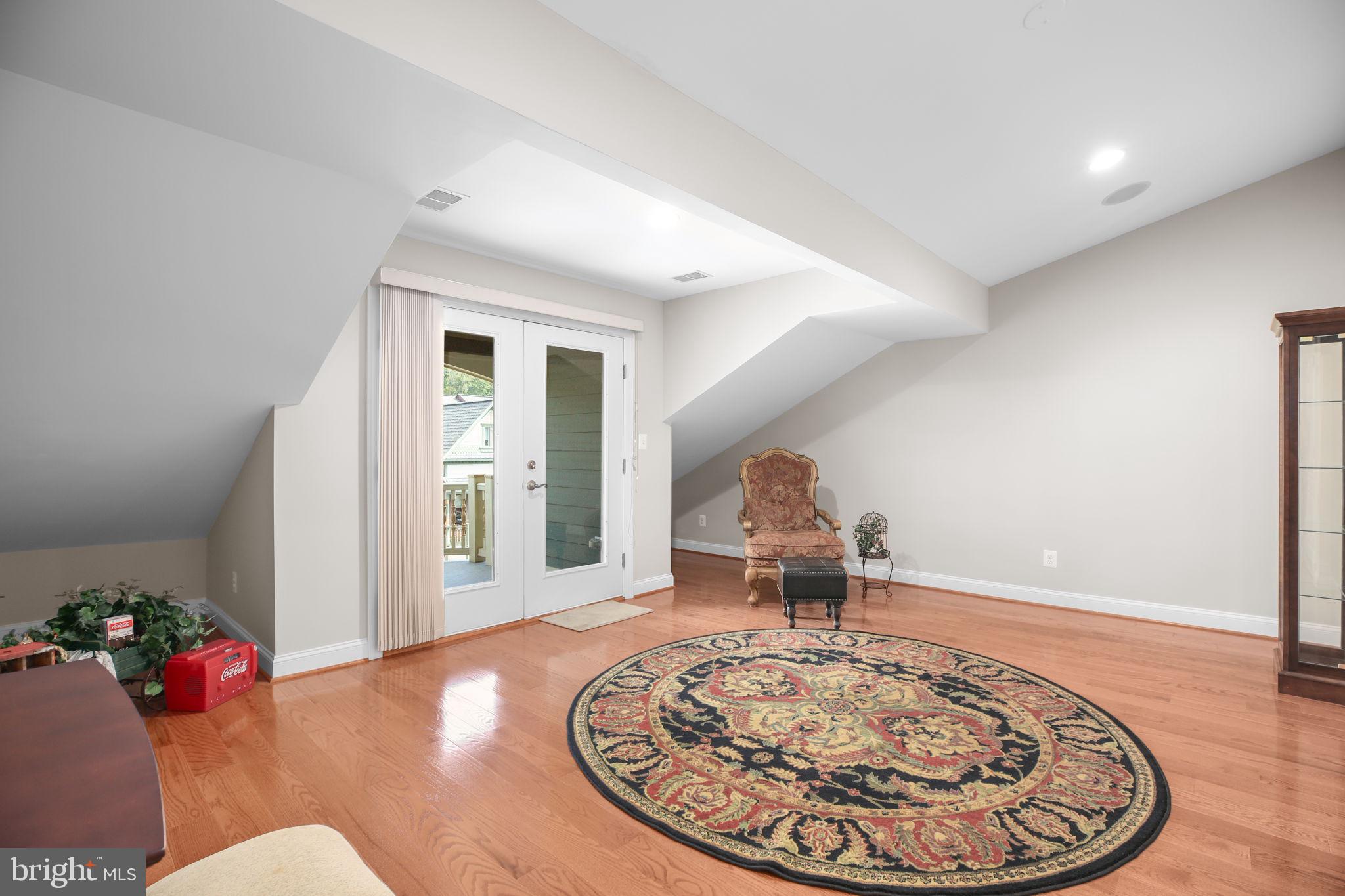 229 Mill Street Occoquan, VA 22125 - Photo 31 of 61 a room with a table and a chandelier