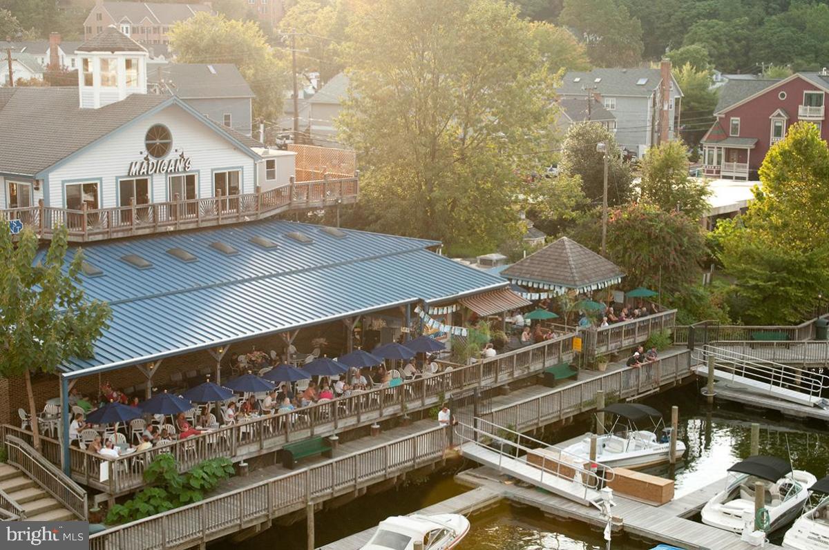 229 Mill Street Occoquan, VA 22125 - Photo 56 of 61 a view of a balcony with two chairs and a table