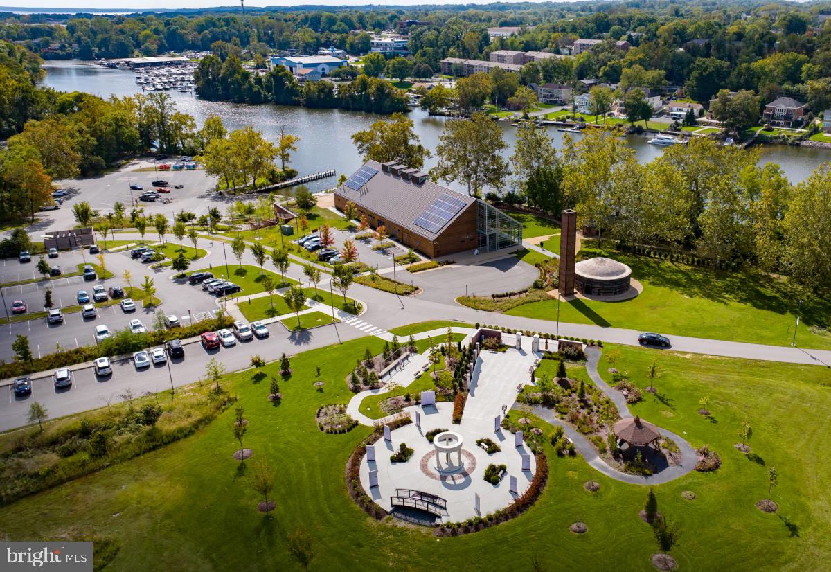 229 Mill Street Occoquan, VA 22125 - Photo 60 of 61 an aerial view of a house with outdoor space and lake view