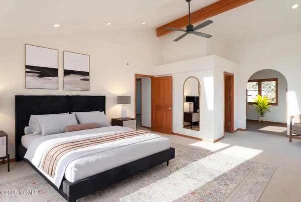 a view of balcony with wooden floor and fence