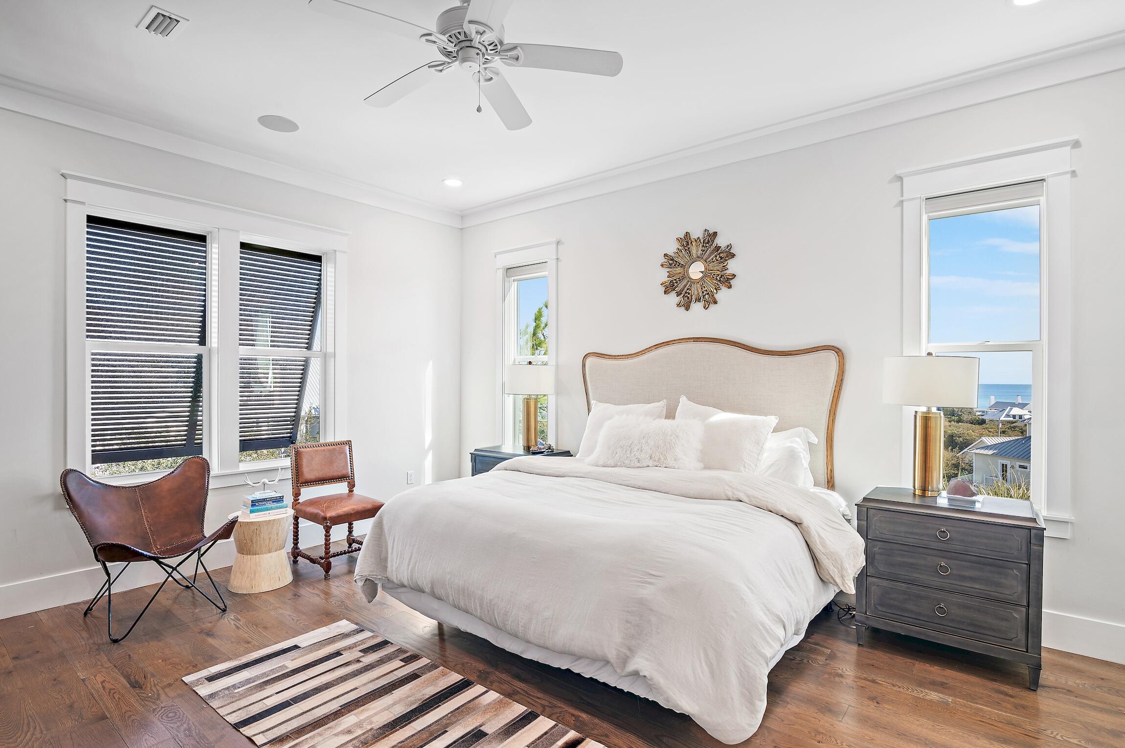 87 Bullard Road Santa Rosa Beach, FL 32459 - Photo 29 of 37 a bedroom with a bed and glass windows