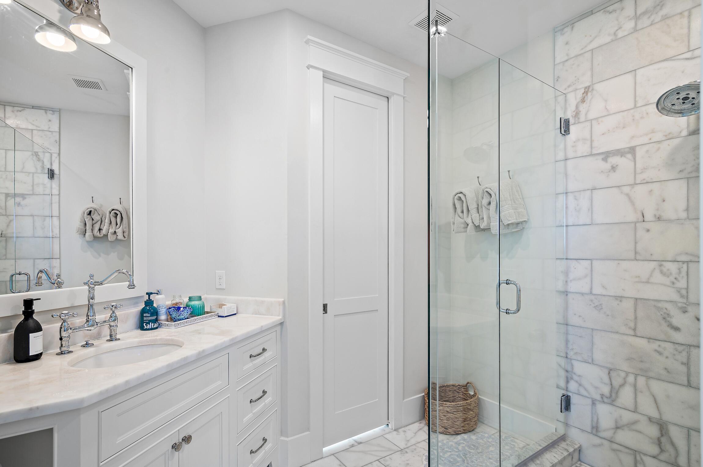 87 Bullard Road Santa Rosa Beach, FL 32459 - Photo 30 of 37 a bathroom with a double vanity sink mirror and shower