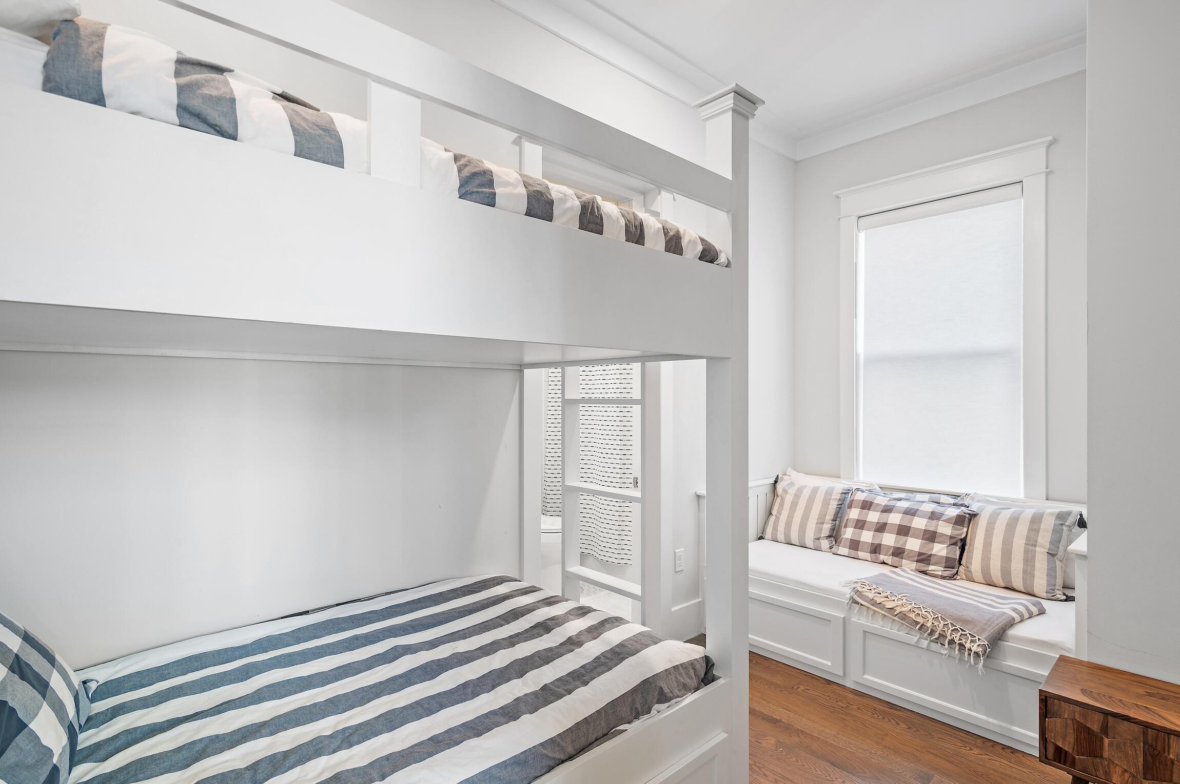 87 Bullard Road Santa Rosa Beach, FL 32459 - Photo 32 of 37 a bedroom with a bed and a couch