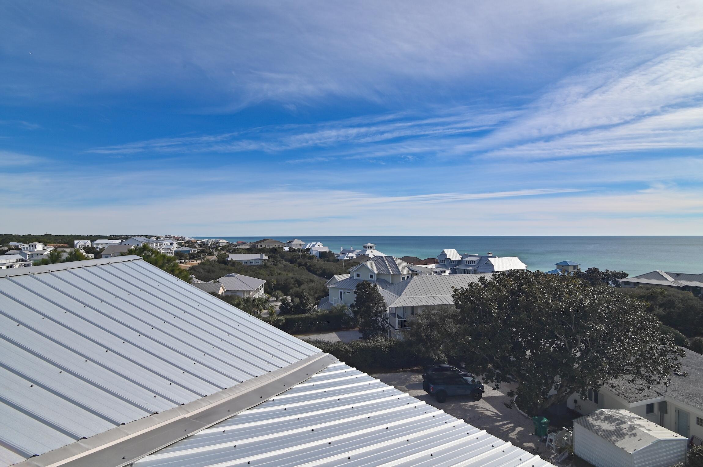 87 Bullard Road Santa Rosa Beach, FL 32459 - Photo 34 of 37 a view of a terrace with a yard