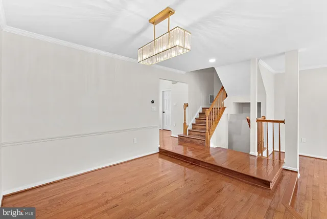 a view of entryway with wooden floor