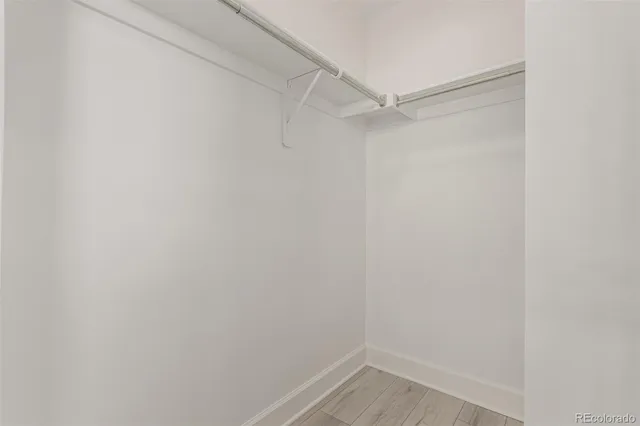a view of an empty walk in closet