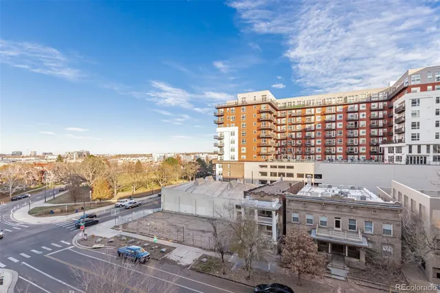 a view of balcony with furniture