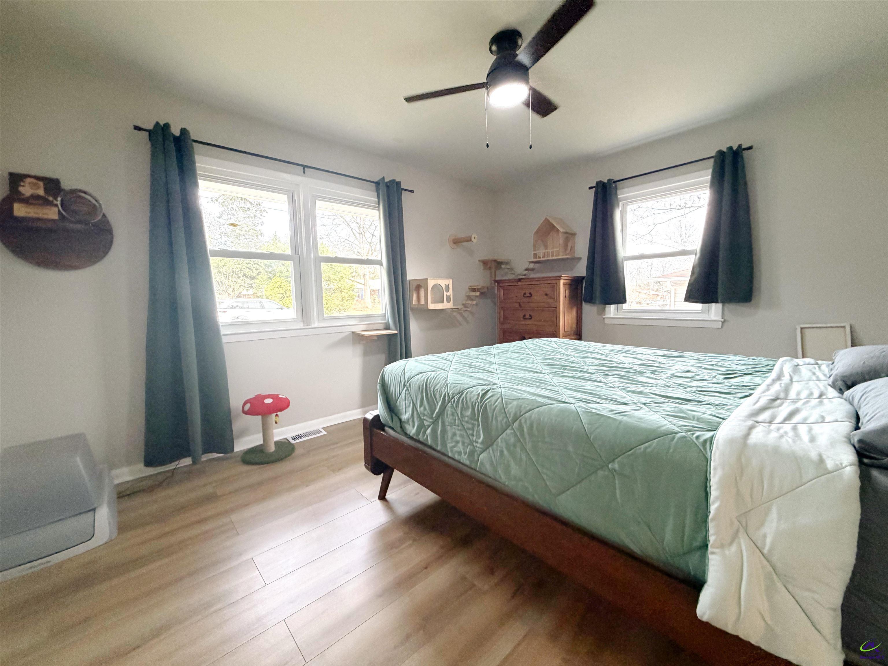 108 Weaver Road Warner Robins, GA 31093 - Photo 15 of 26 a bedroom with a bed and a window