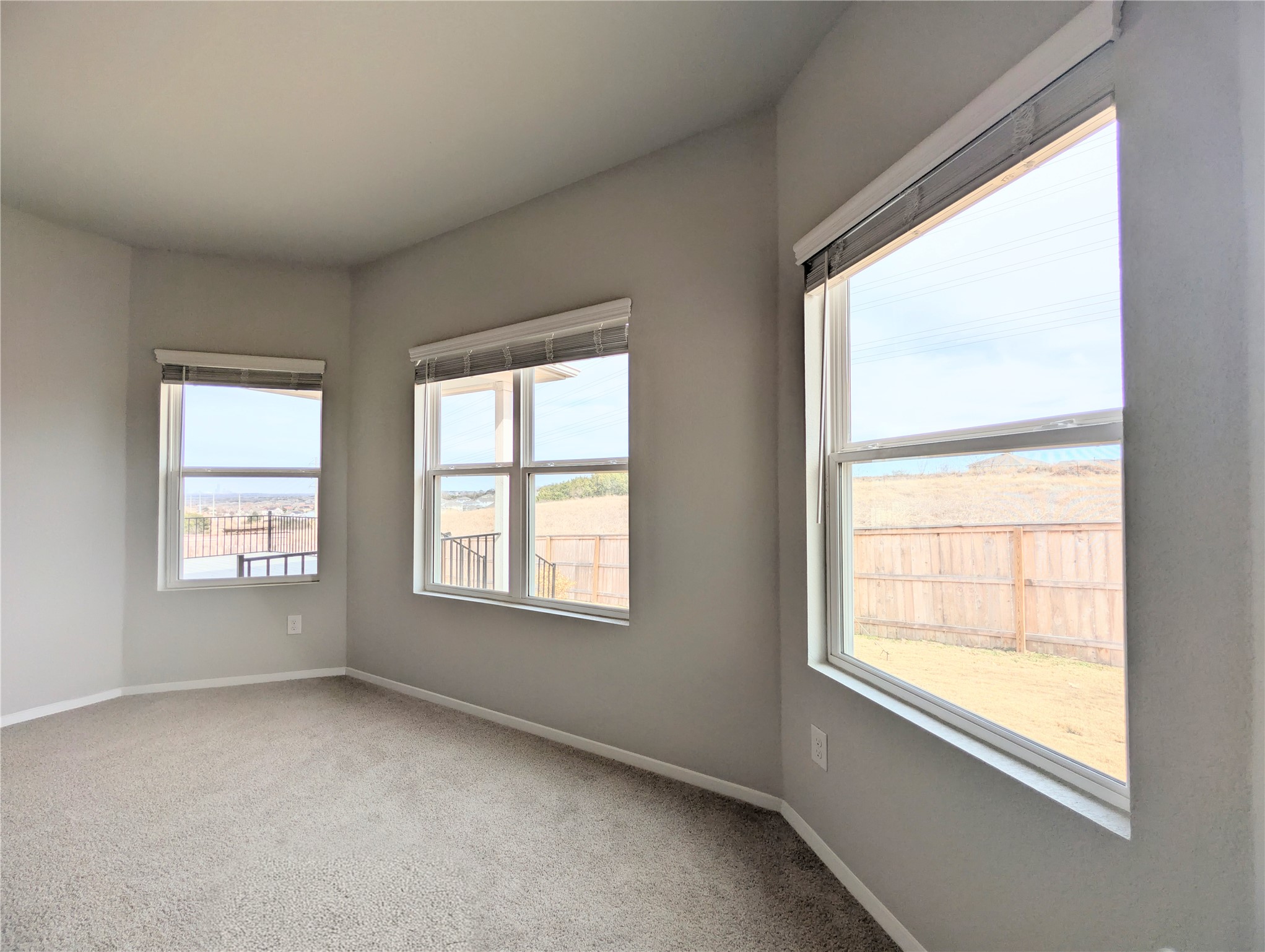 5524 Sacra Cove Austin, TX 78747 - Photo 20 of 37 Primary bedroom with a custom 3 panel design & baseboards