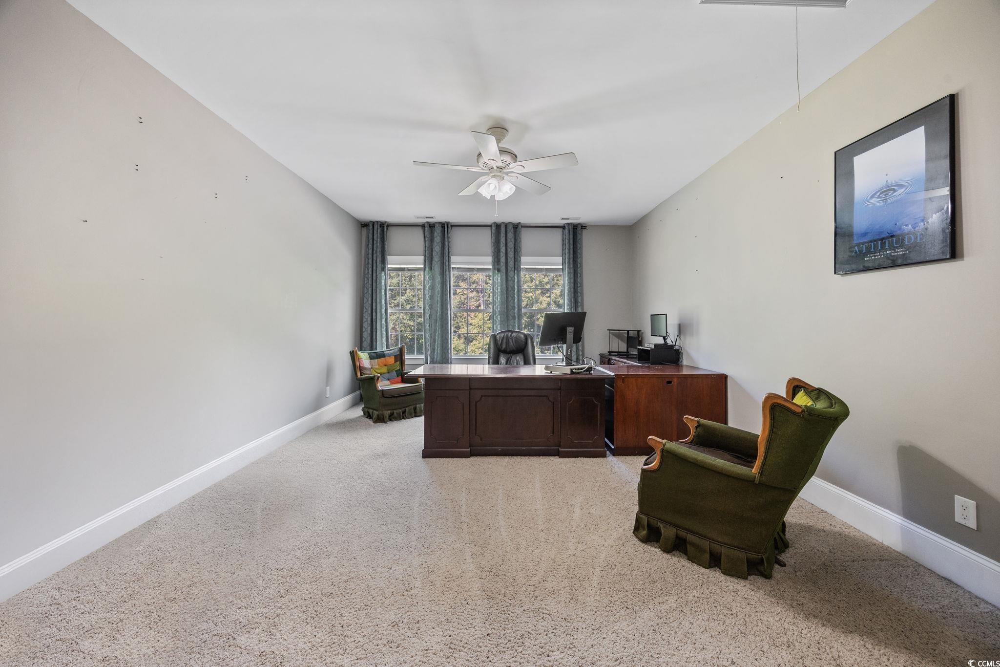 2273 Starduster Lane Little River, SC 29566 - Photo 21 of 40 Office area with light carpet and ceiling fan
