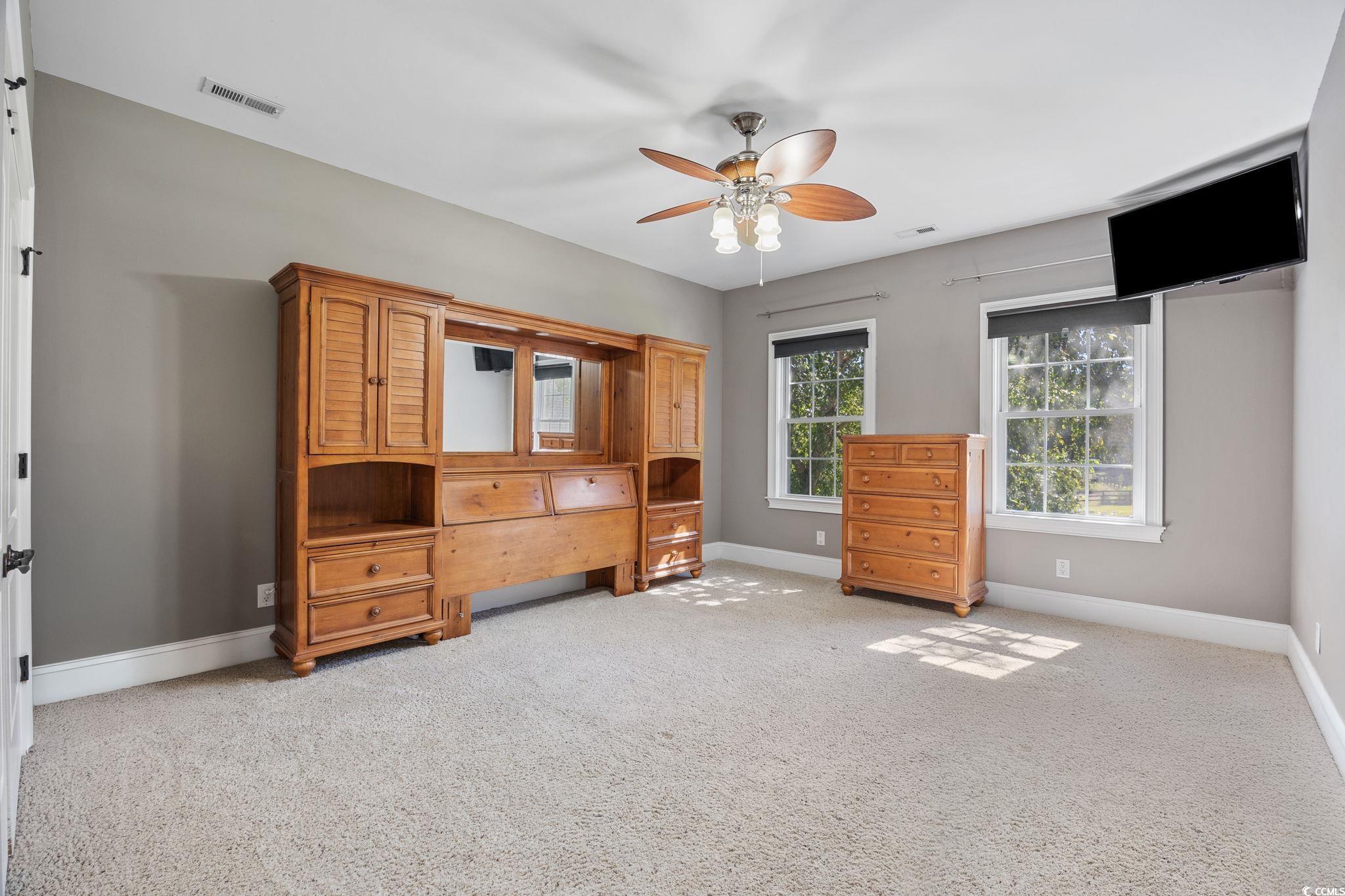 2273 Starduster Lane Little River, SC 29566 - Photo 26 of 40 Bedroom with carpet flooring and a ceiling fan