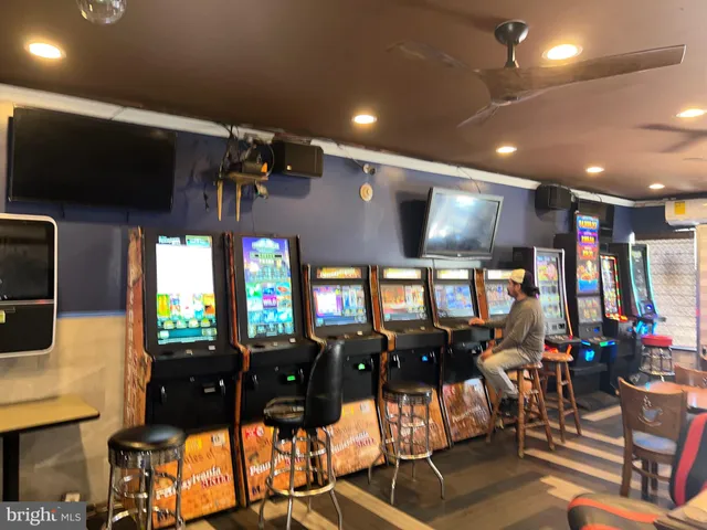a view of a living room and dining room