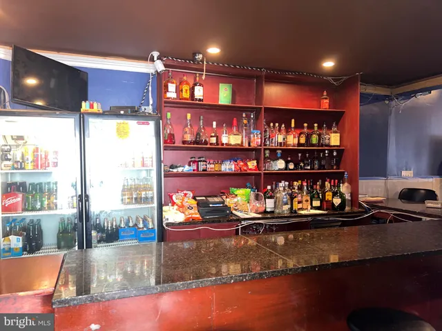 a view of a balcony with wooden floor