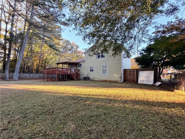 a front view of house with garden