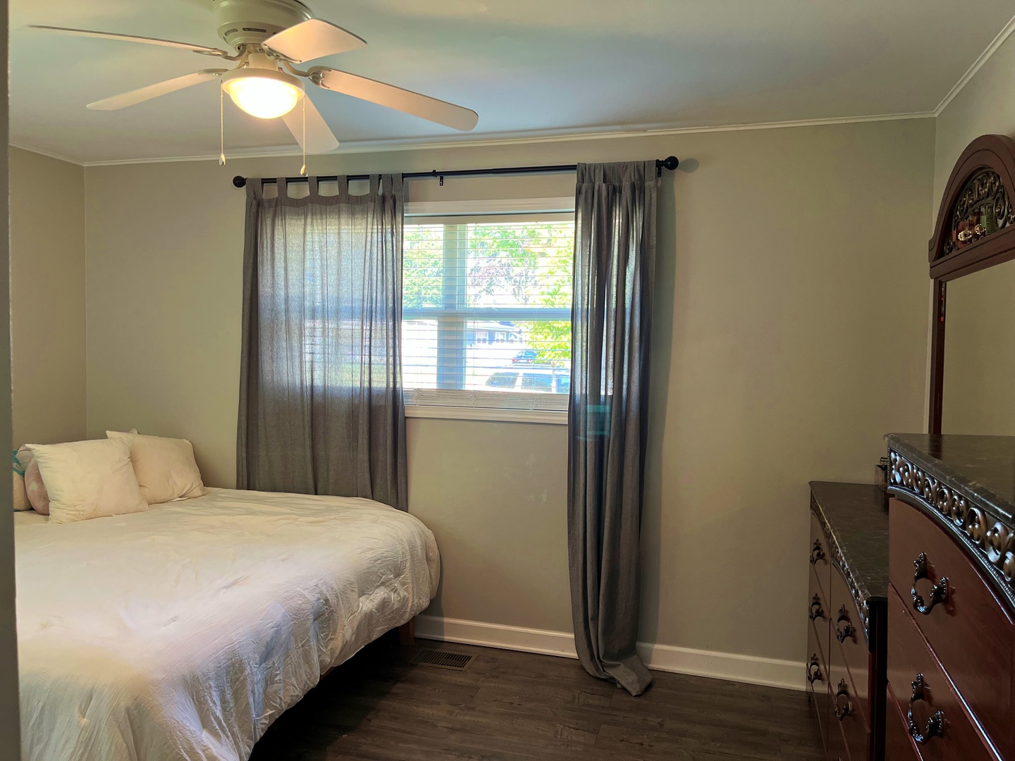 2909 Owl Drive Rolling Meadows, IL 60008 - Photo 6 of 11 a bedroom with a bed and a flat tv screen on a dresser