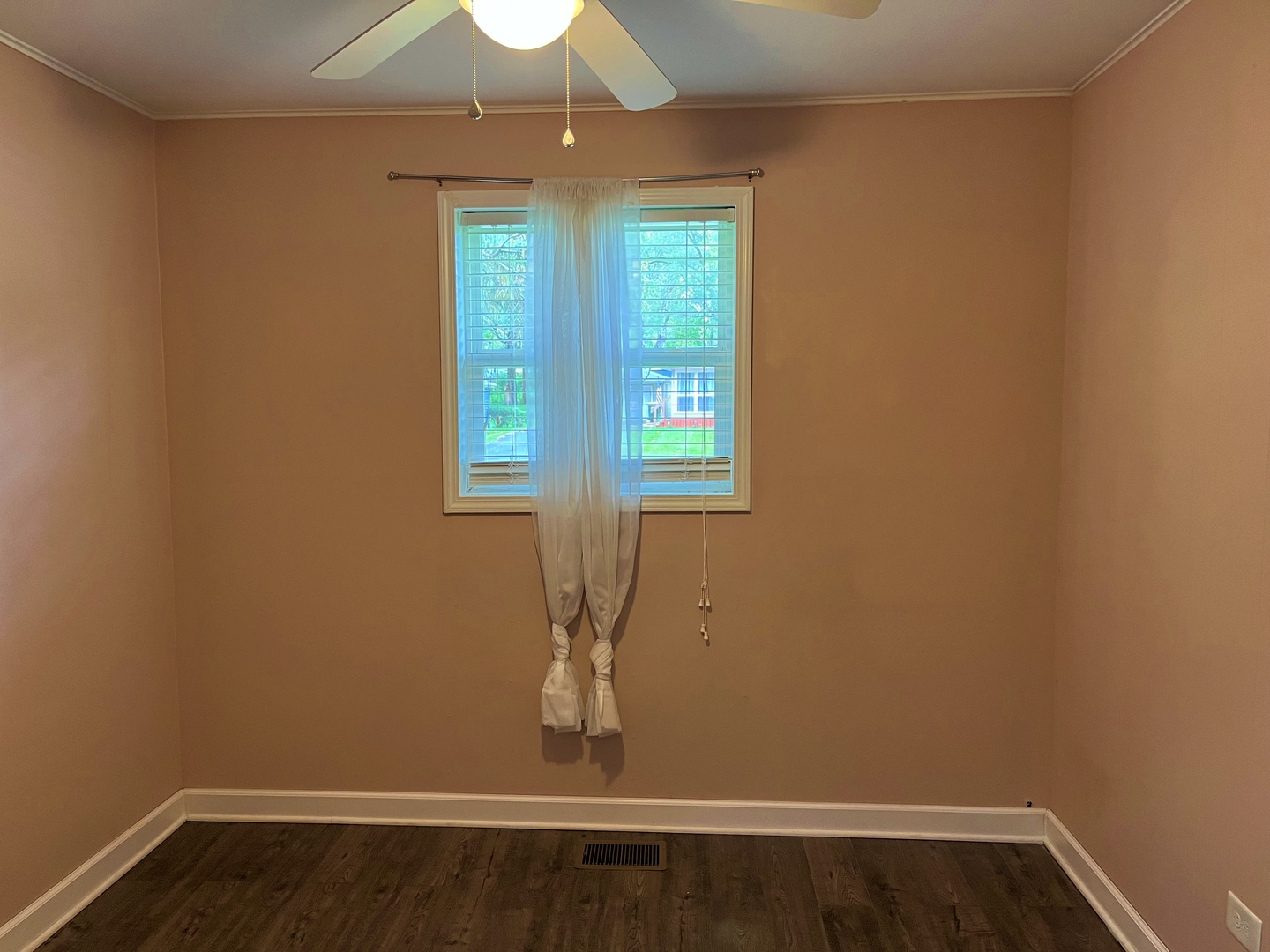 2909 Owl Drive Rolling Meadows, IL 60008 - Photo 8 of 11 an empty room with wooden floor and windows