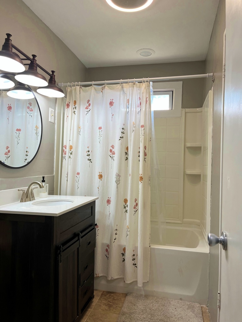 2909 Owl Drive Rolling Meadows, IL 60008 - Photo 9 of 11 a bathroom with a sink and a mirror