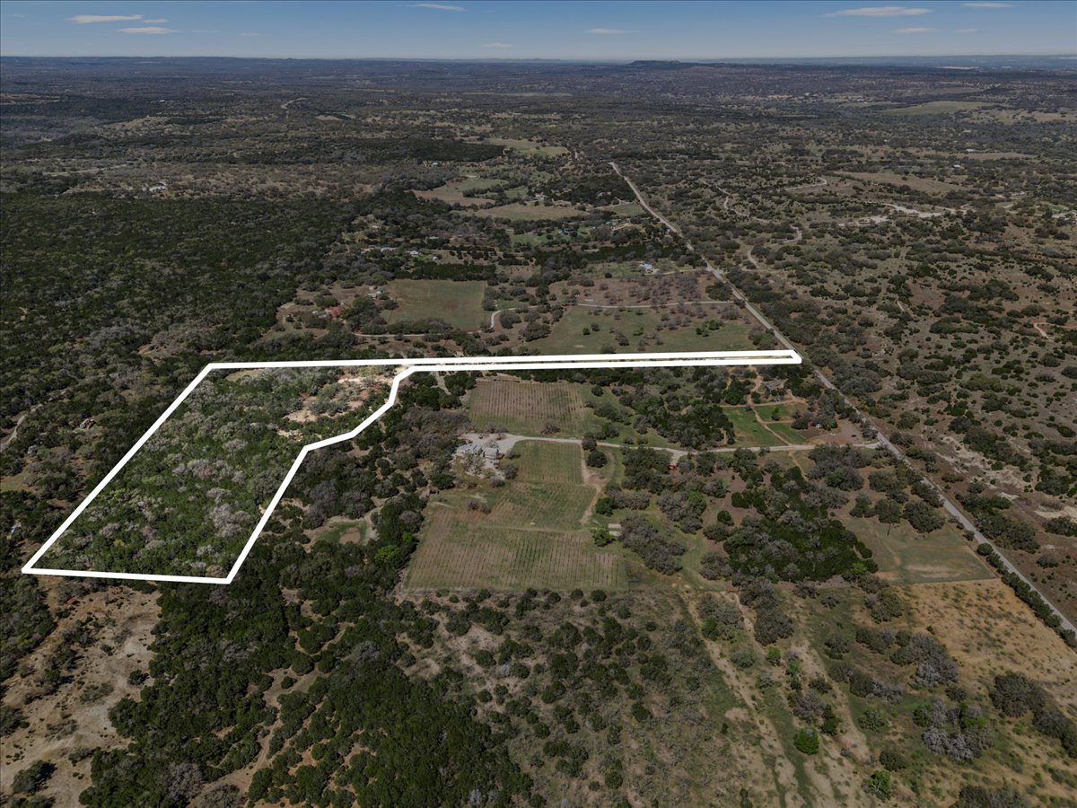25723 Hamilton Pool Road Round Mountain, TX 78663 - Photo 15 of 32 Aerial view of sparsely populated area with property boundaries highlighted