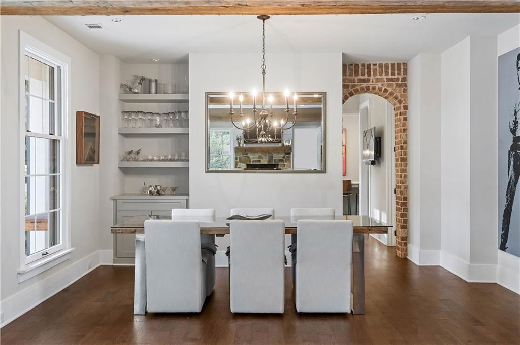 7255 Old Rico Road Chattahoochee Hills, GA 30268 - Photo 14 of 78 a view of a kitchen with furniture and wooden floor