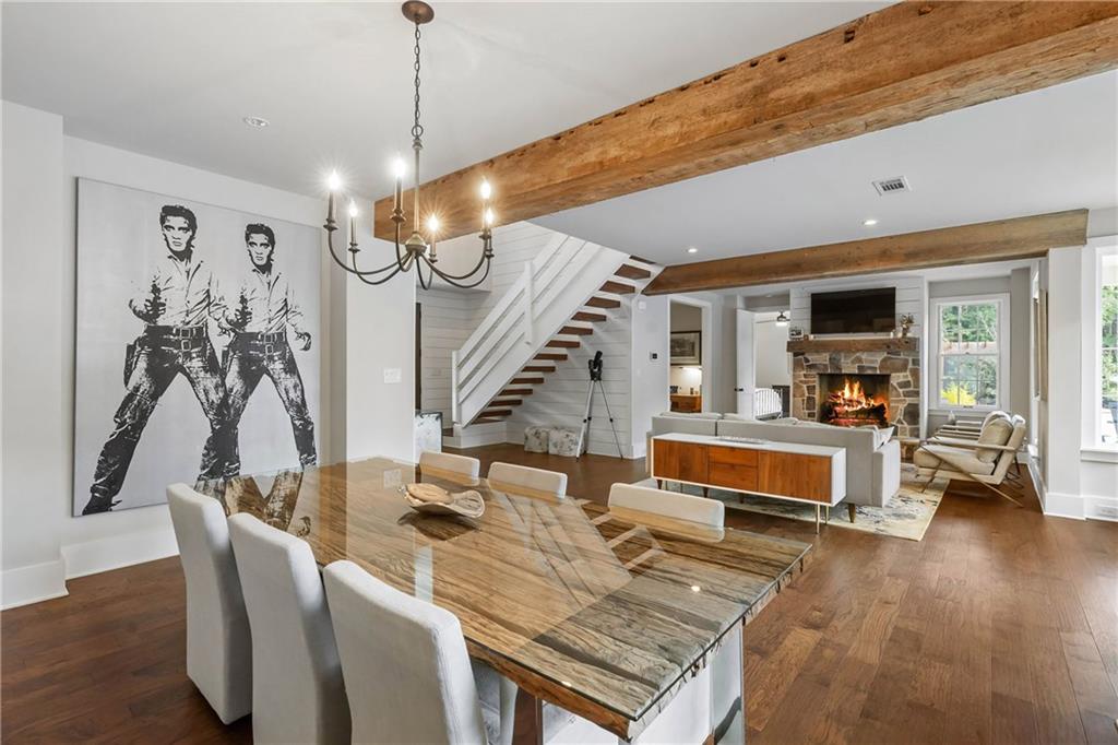 7255 Old Rico Road Chattahoochee Hills, GA 30268 - Photo 16 of 78 a living room with furniture and a chandelier