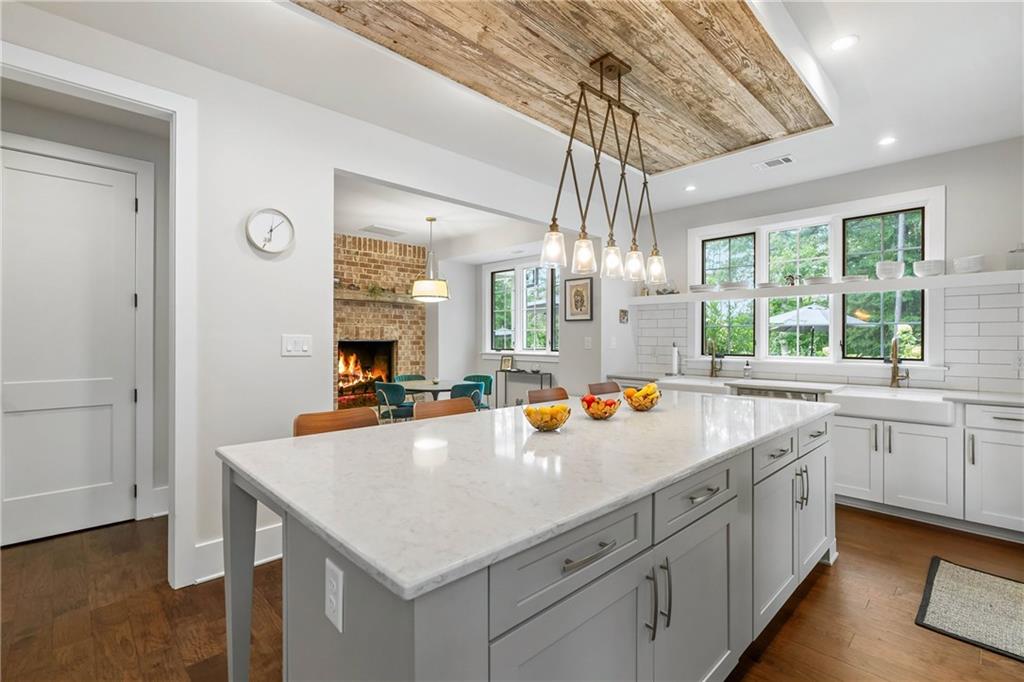 7255 Old Rico Road Chattahoochee Hills, GA 30268 - Photo 26 of 78 a view of a kitchen counter space a sink and dishwasher kitchen view