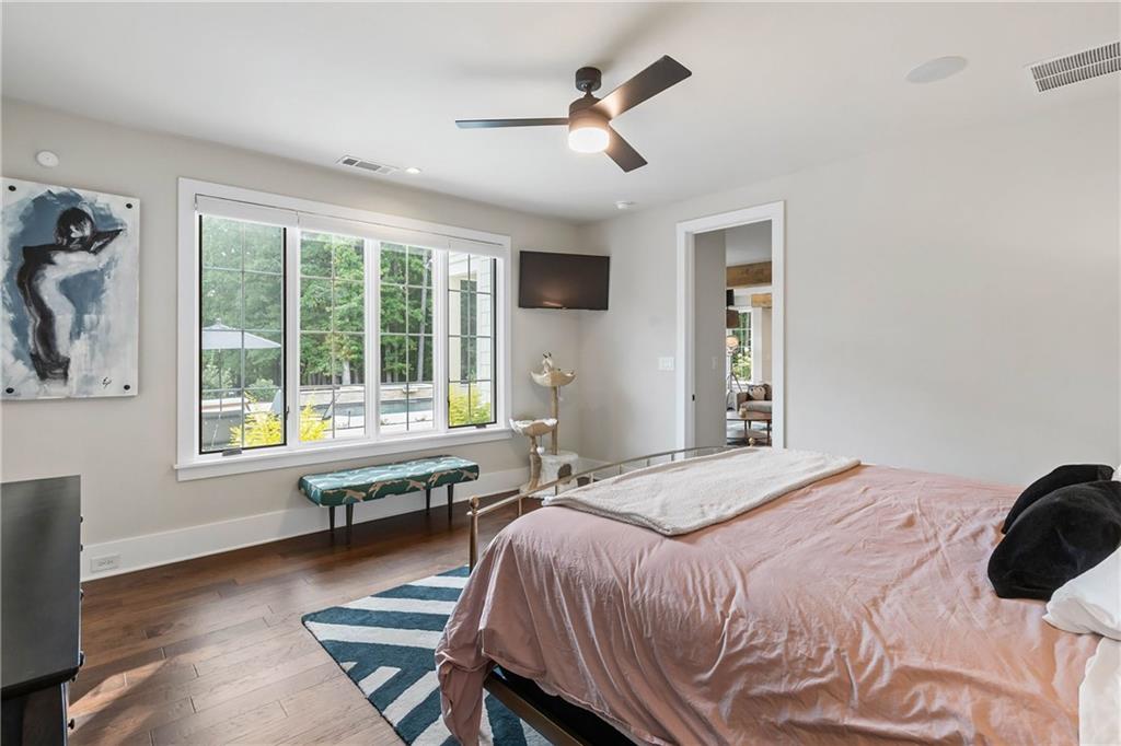 7255 Old Rico Road Chattahoochee Hills, GA 30268 - Photo 30 of 78 a bedroom with a bed and a large window