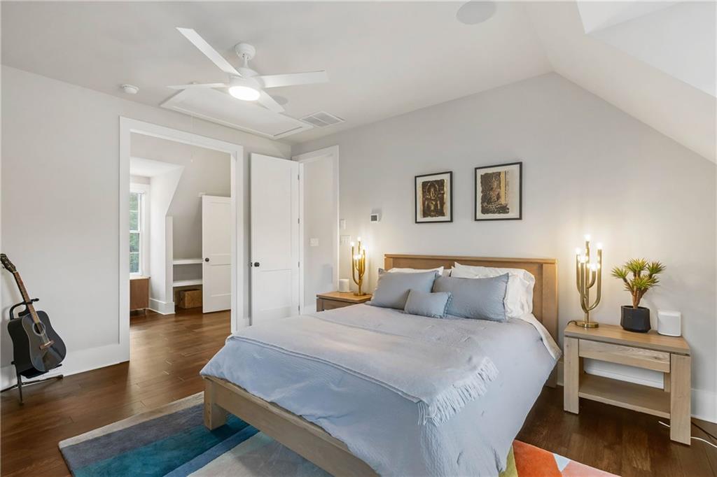 7255 Old Rico Road Chattahoochee Hills, GA 30268 - Photo 36 of 78 a bedroom with a bed and wooden floor