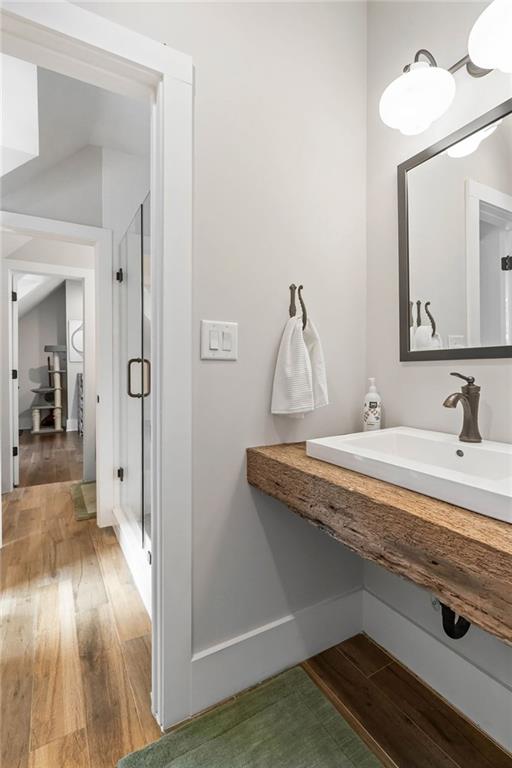 7255 Old Rico Road Chattahoochee Hills, GA 30268 - Photo 38 of 78 a bathroom with a sink and a mirror
