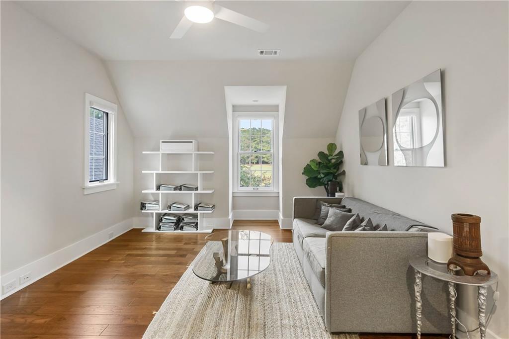 7255 Old Rico Road Chattahoochee Hills, GA 30268 - Photo 39 of 78 a living room with furniture and a large window