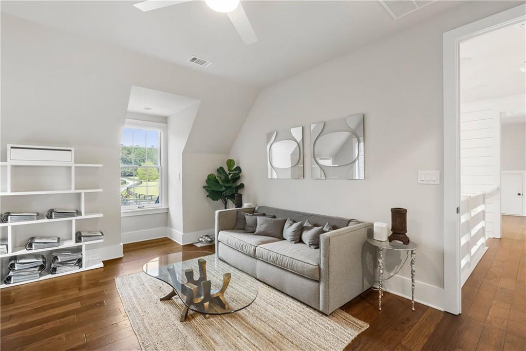 7255 Old Rico Road Chattahoochee Hills, GA 30268 - Photo 40 of 78 a living room with furniture or wooden floor and a large window