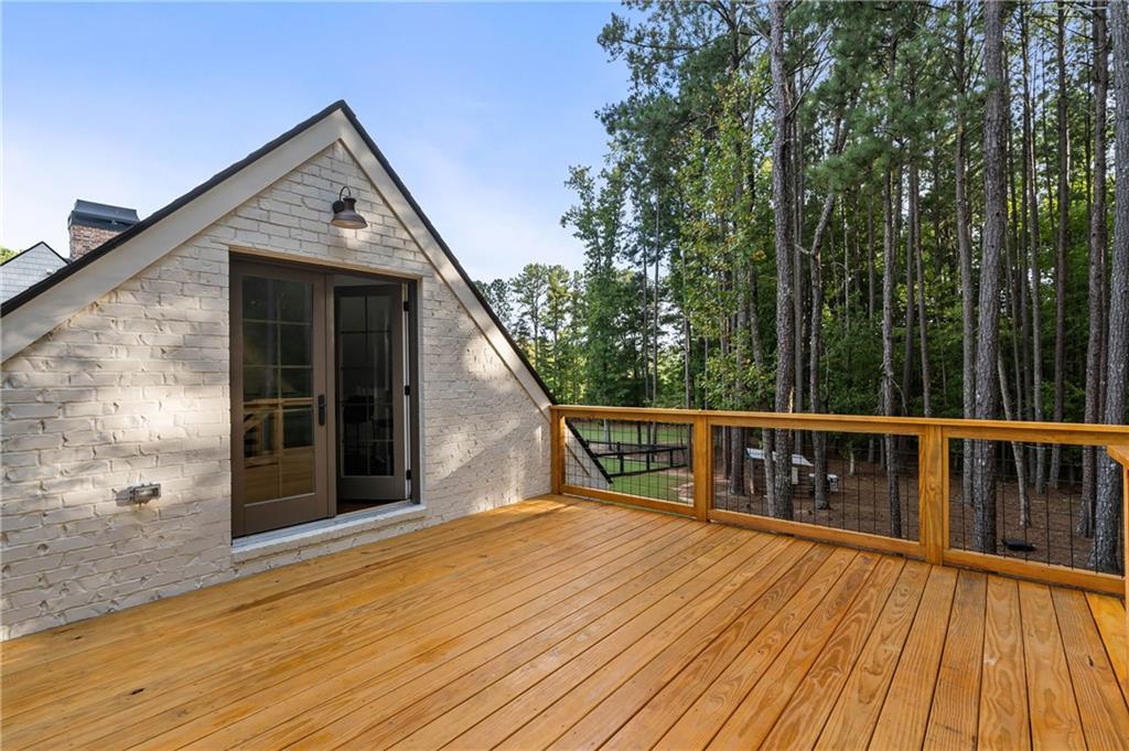 7255 Old Rico Road Chattahoochee Hills, GA 30268 - Photo 49 of 78 a view of balcony with deck and wooden floor
