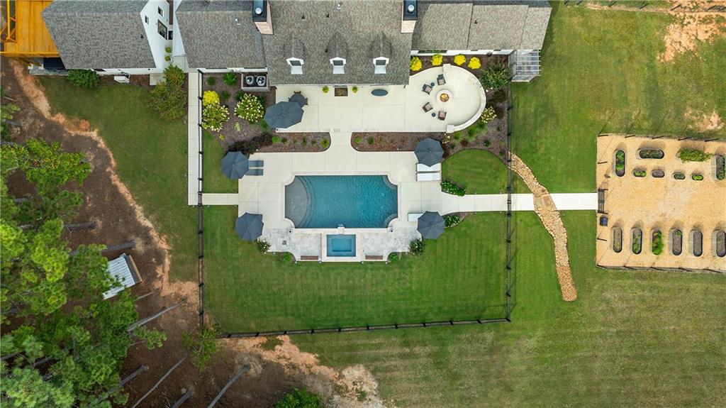 7255 Old Rico Road Chattahoochee Hills, GA 30268 - Photo 64 of 78 an aerial view of a house with outdoor space pool seating area and yard