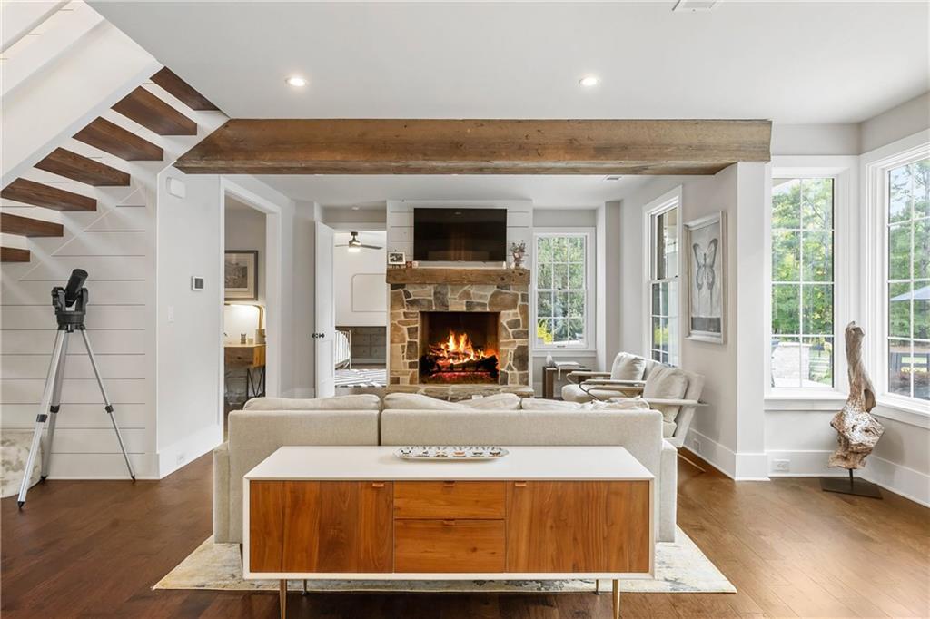 7255 Old Rico Road Chattahoochee Hills, GA 30268 - Photo 7 of 78 a living room with fireplace furniture and a fireplace