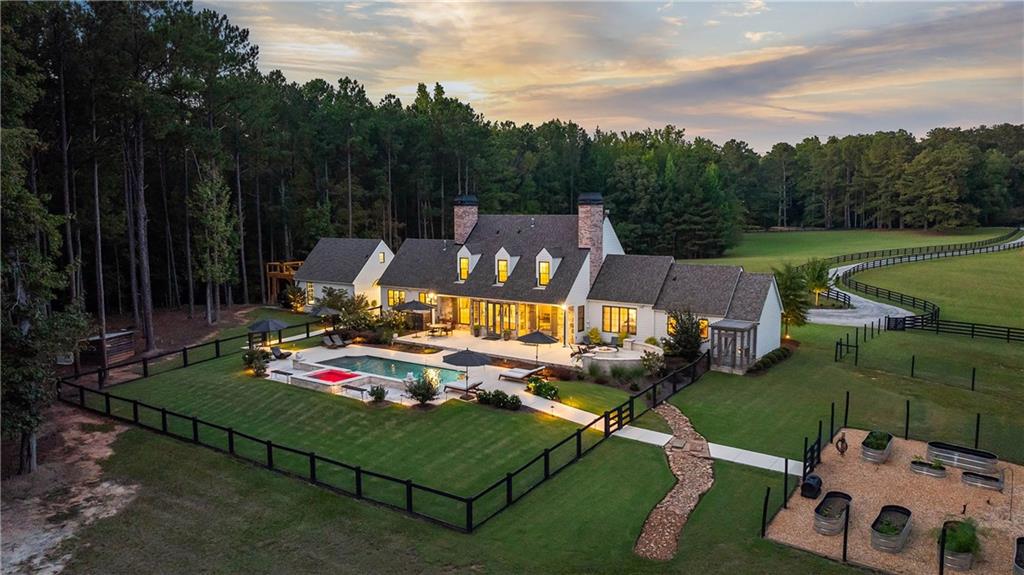 7255 Old Rico Road Chattahoochee Hills, GA 30268 - Photo 72 of 78 an aerial view of a house with garden space and street view