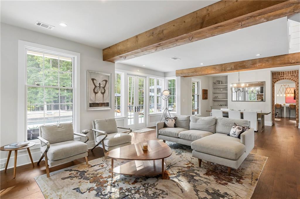 7255 Old Rico Road Chattahoochee Hills, GA 30268 - Photo 10 of 78 a living room with furniture and a large window