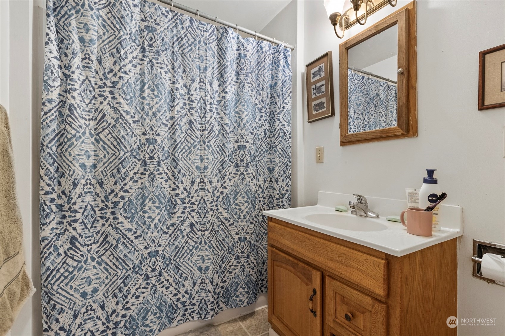 4859 Noon Road Bellingham, WA 98226 - Photo 14 of 40 a bathroom with a sink and a mirror