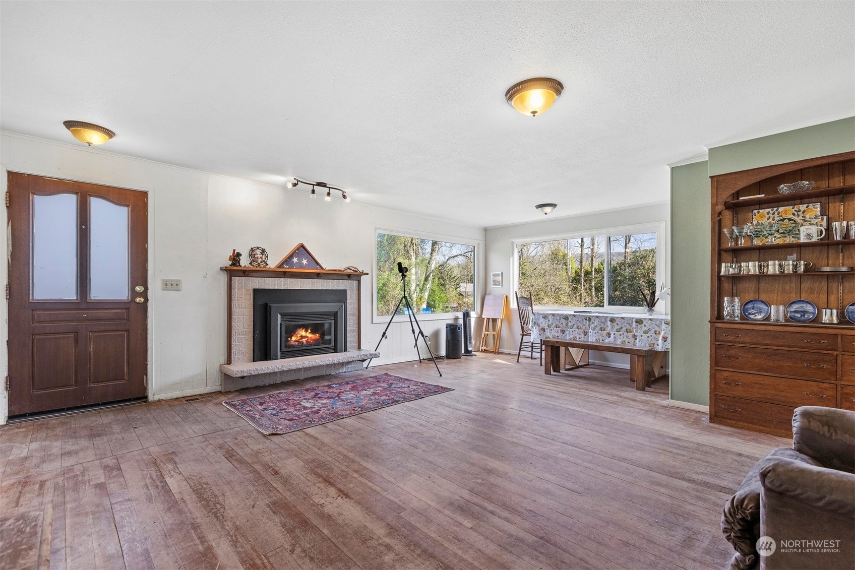 4859 Noon Road Bellingham, WA 98226 - Photo 10 of 40 a living room with furniture and a fireplace