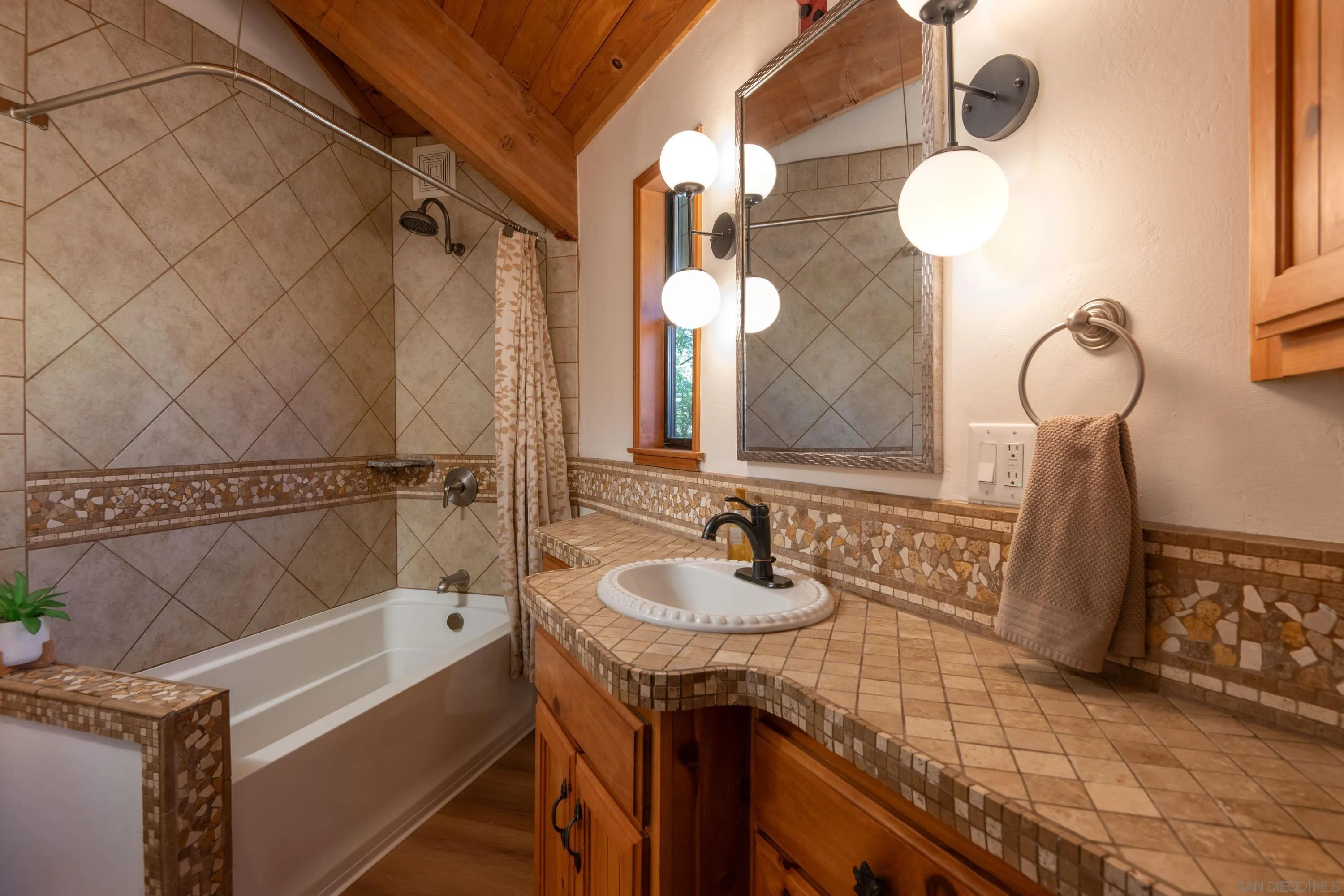 3413 Fern Meadow Road Palomar Mountain, CA 92060 - Photo 16 of 38 a bathroom with a sink and a mirror