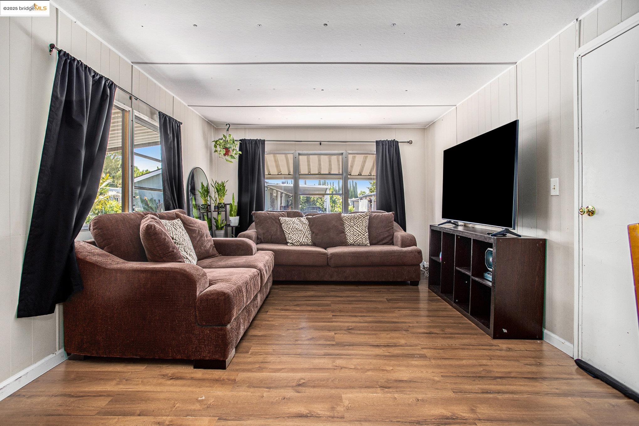 3301 Buchanan Road, Unit 118 Antioch, CA 94509 - Photo 4 of 15 Living room with wood finished floors