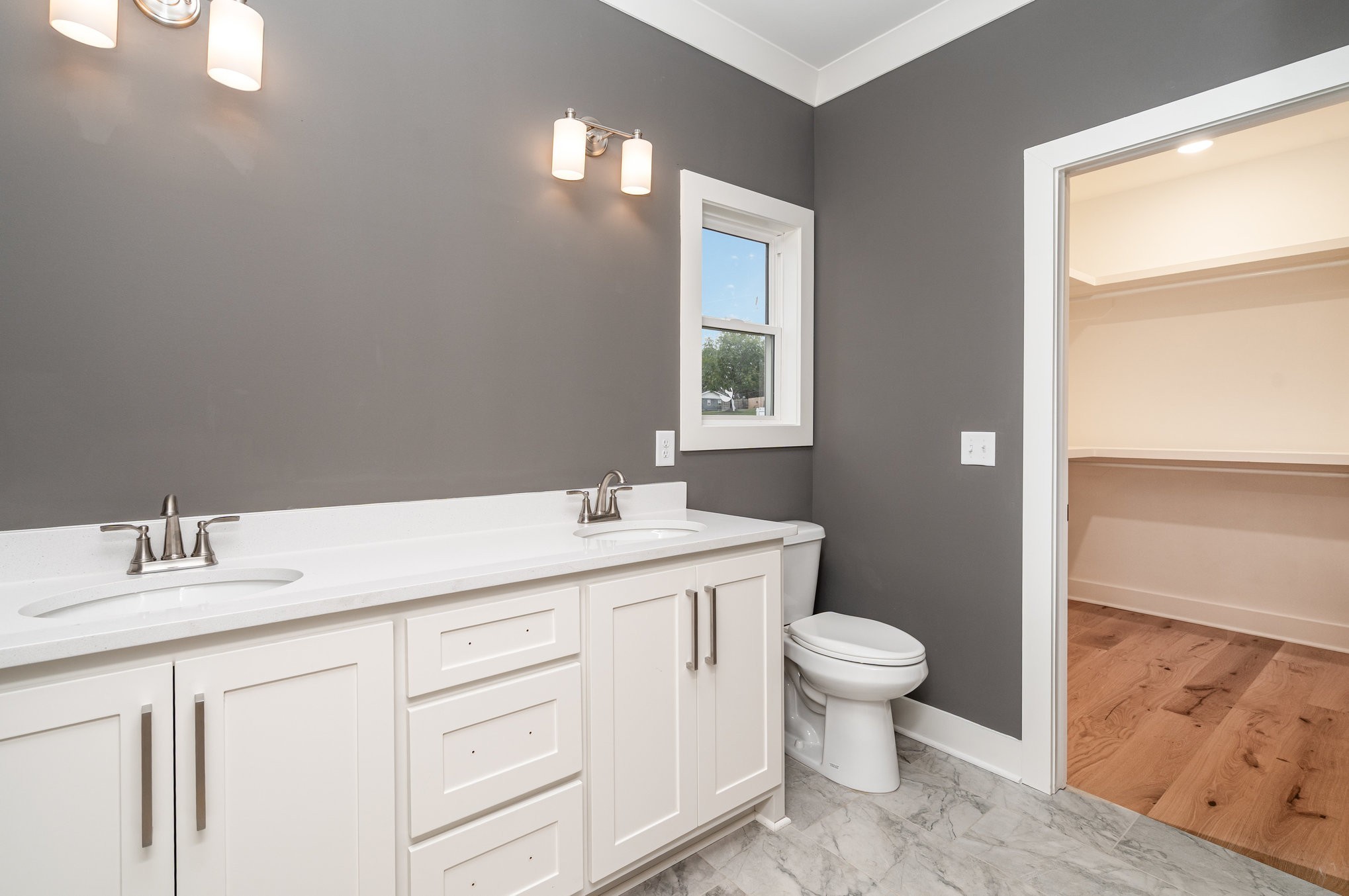 95 Crenshaw Road Hartsville, TN 37074 - Photo 13 of 31 a bathroom with a sink toilet and window