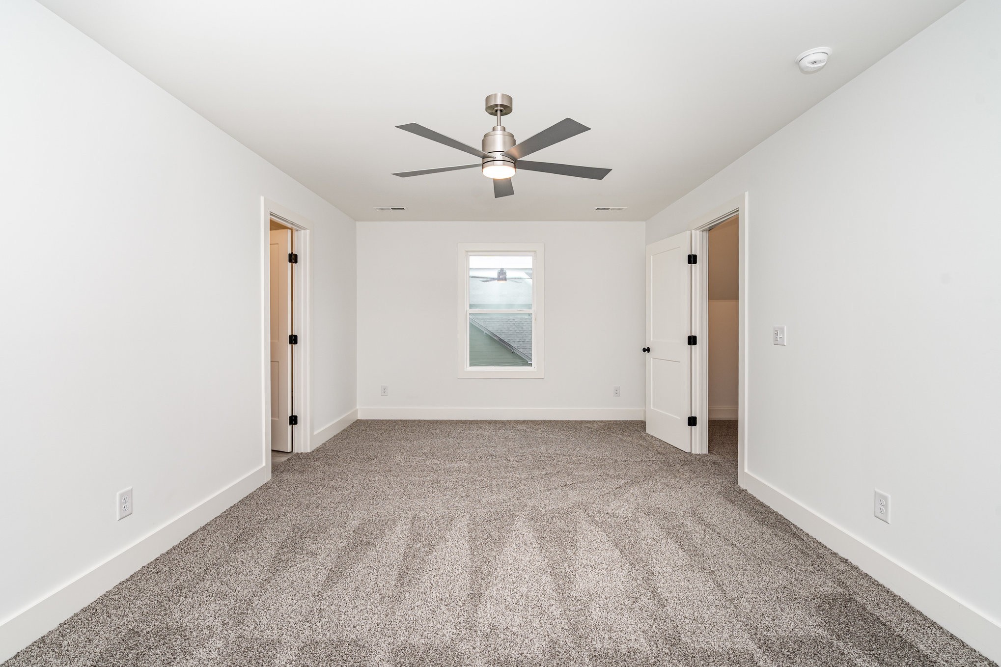 95 Crenshaw Road Hartsville, TN 37074 - Photo 21 of 31 a view of an empty room with a ceiling fan