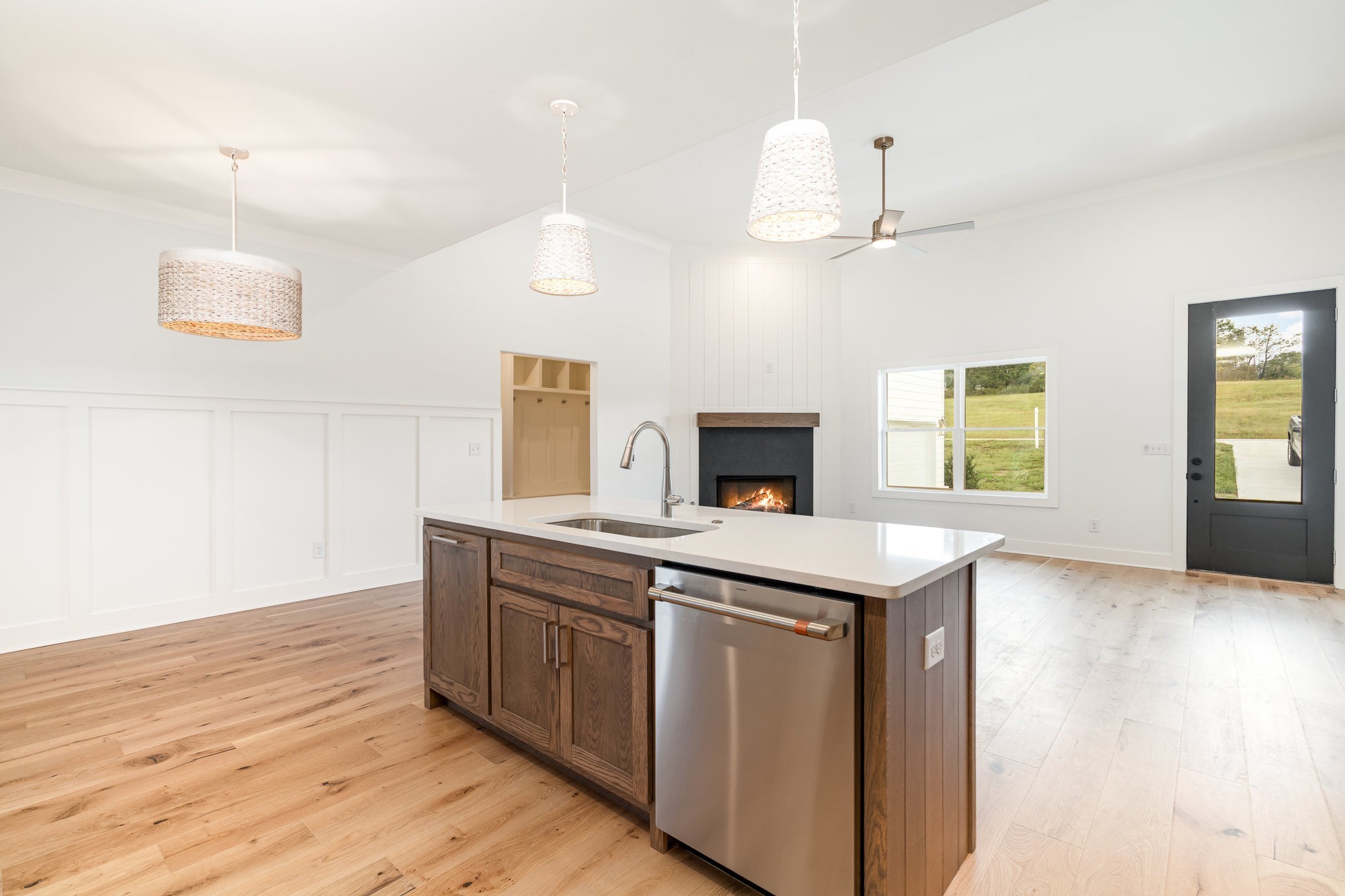 95 Crenshaw Road Hartsville, TN 37074 - Photo 7 of 31 a kitchen with kitchen island a sink and a stove with wooden floor